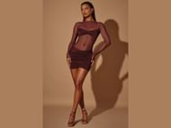 The Sheer paneled long sleeve mini dress "Essie" (Image via Oh Polly)